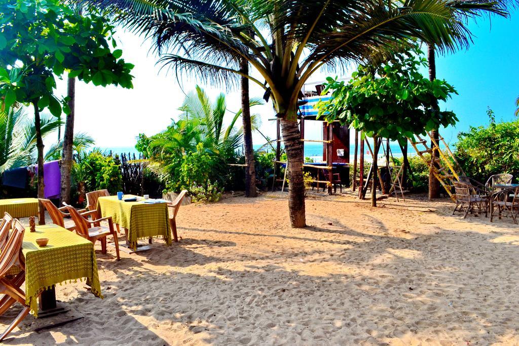 Pele'S Windsong Wood Cottage On The Beach Бенаулим Экстерьер фото