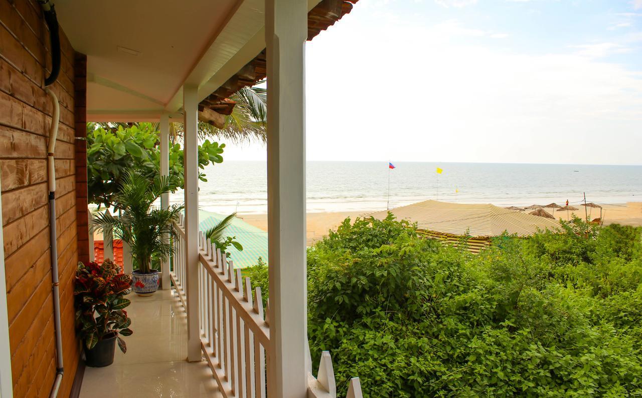 Pele'S Windsong Wood Cottage On The Beach Бенаулим Экстерьер фото